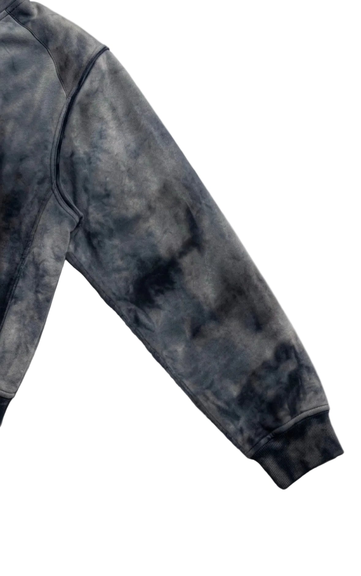 R4RE AEON waxed zip up — close-up of hand-applied wax-wash finish on cotton-nylon sleeve, charcoal grey marbled texture with ribbed cuff detail