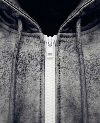 R4RE AEON waxed zip up — contrast white zipper detail against hand-waxed charcoal fabric, close-up of zip pull and teeth